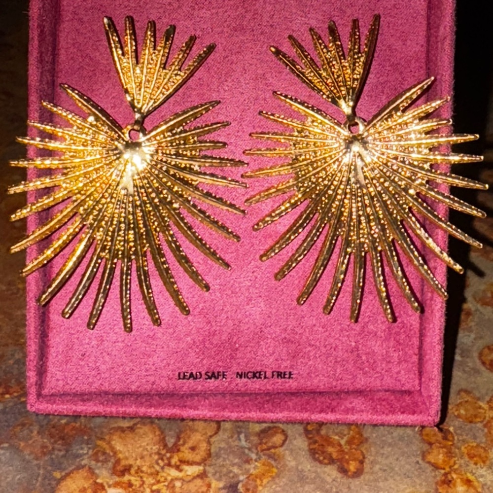Gold fan statement earrings